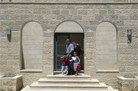 Palestinians continue to move in to new city, Rawabi
